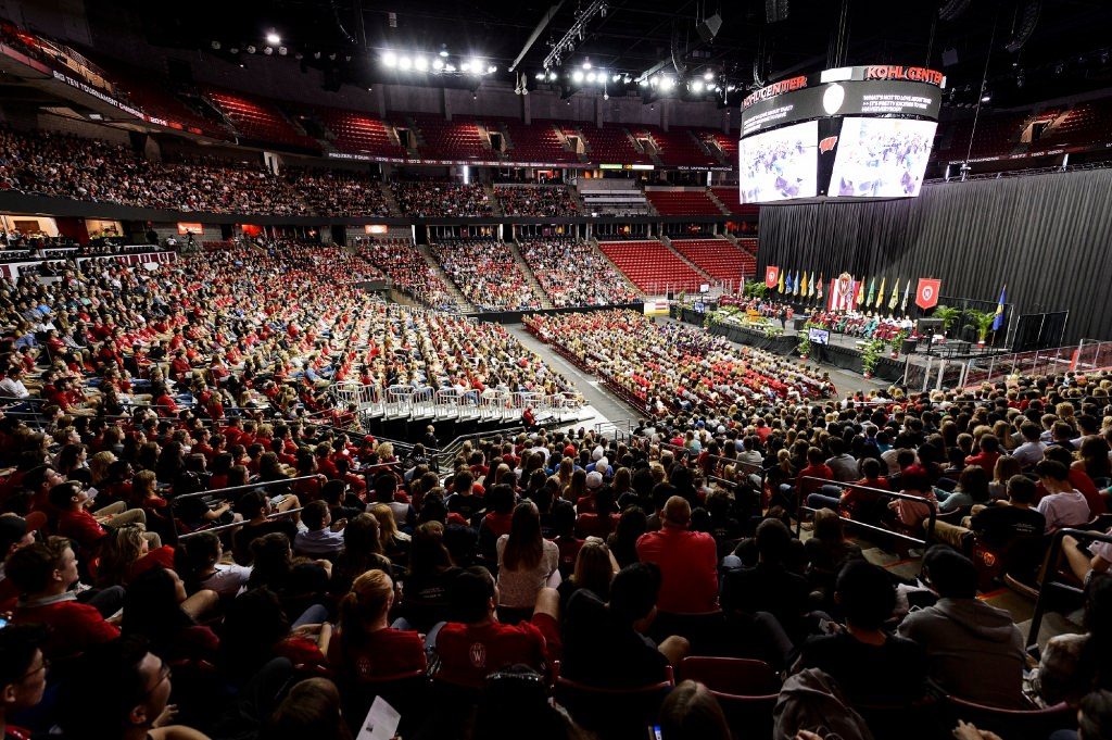 Thousands of first-year students listen to a prerecorded messgae from the faculty at the Chancellor's Convocation. Photo by Jeff Miller.