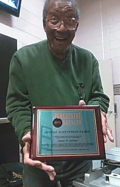 Jim Latimer with his Wisconsin Percussive Arts Society Lifetime Achievement Award