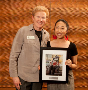 Shannon Thao receives her award fro mDean of Students Lori Berquam.