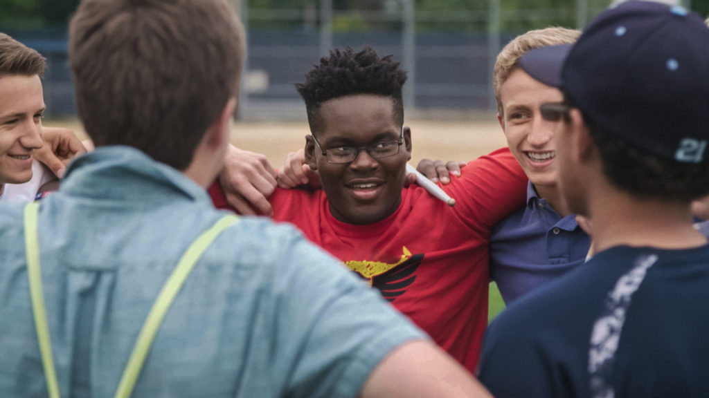 student Kendale McCoy with friends from documentary