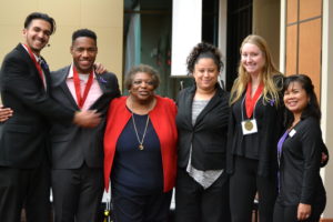 Graduates and staff celebrate the winter 2018 graduation. Photo by Valeria A. Davis