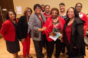 Members of the Delta Sigma Theta Sorority celebrate Gloria Hawkins retirement at a surprise gathering. Photo by Amadou Kromah.