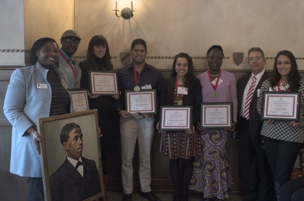 (L-R) Assistant Dean Dr. LaRuth McAfee, Rastafa Geddes, Alexandra MacMillan Uribe, Albert Burgess-Hull, Natalie Guerrero, Evelyn Hammond, Dean Bill Karpus, Nadia Khan.