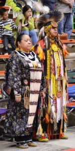 Native couple in full regalia at Powwow 2015 Photo by Valeria Davis