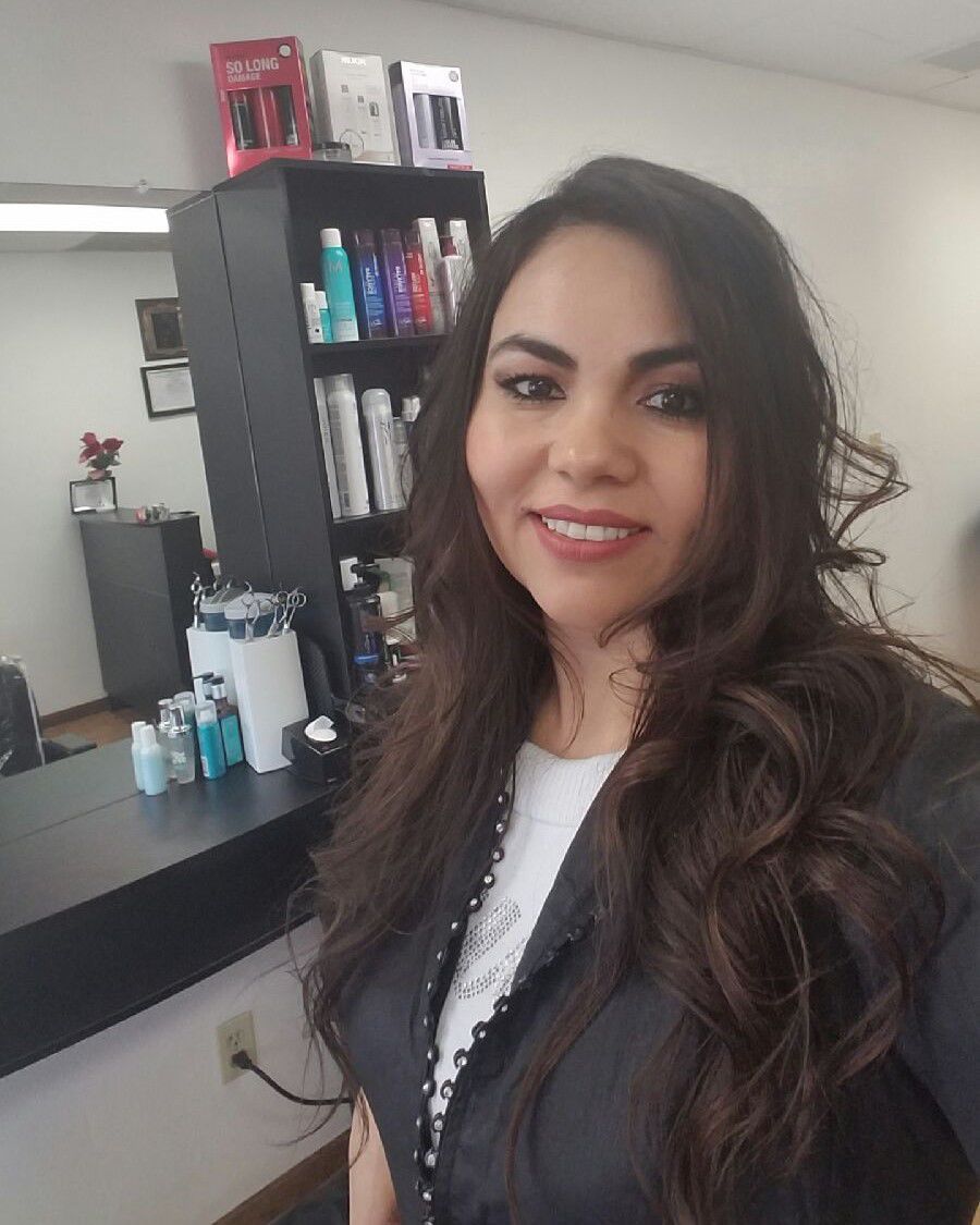 Lorena Villalobos, owner of Lorena’s Hair Salon in Fitchburg, is one of the stylists, and knows her clients trust her. FILE PHOTO