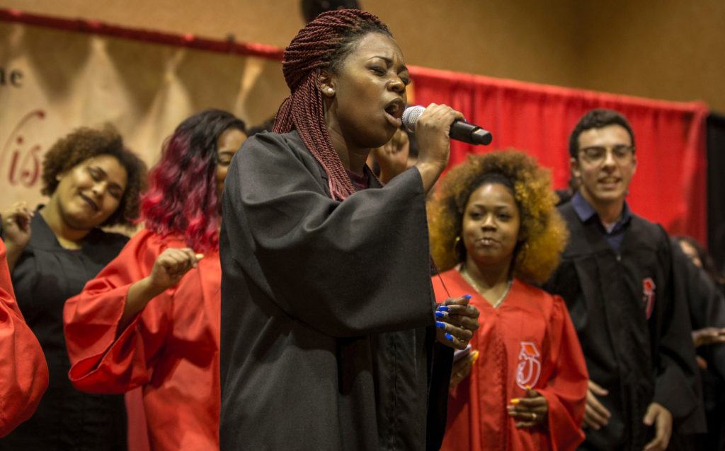 The PEOPLE Summer Chorus, directed by Dantrell Cotton, brought a vocal lift to the Rise event, fanning out into the audience with joy at the annual Recognition Banquet July 21, 2017, DDEEA photot by Andy Manis.