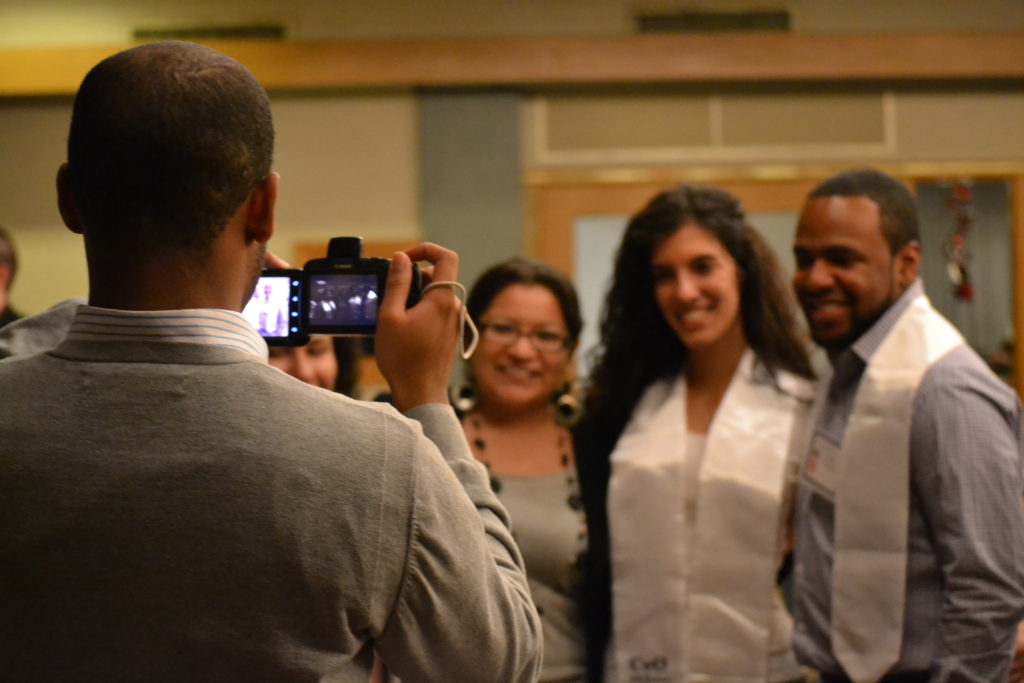 CEO staff, mentors and students gather for the December Graduatiion celebration. Photo by Valeria A.Davis