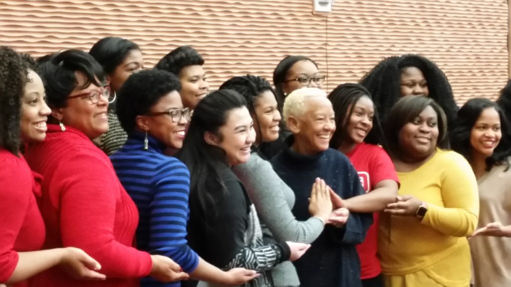 Campus Delta Theta Sigma Sorority members celebrate Black History Month with renown poet Nikki Giovanni. Photo by Valeria A. Davis.