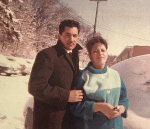 Luciano and Martha Barraza pose in front of their snow-covered car outside their first apartment at Eagle Heights at UW–Madison during the fall semester of 1963. Photo: Submitted