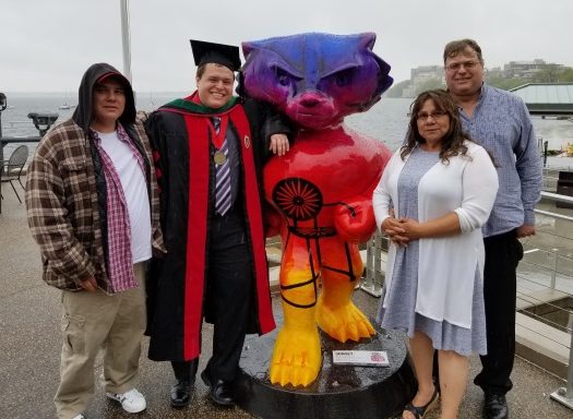 Alex graduated from UW-Madison Medical School on May 11. The medical school held a ceremony that morning for the students, and then had a ceremony for family that afternoon at the Kohl Center.