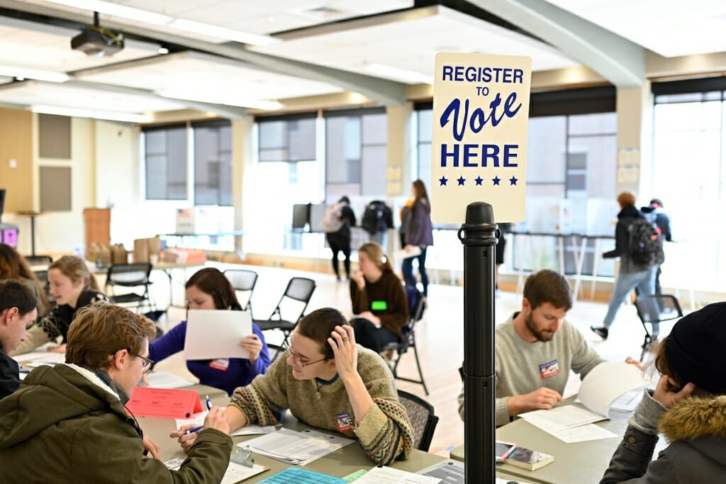 Students register to vote before filling out midterm election ballots at the Frank Holt Center on campus on Nov. 6, 2018. Photo: Jeff Miller