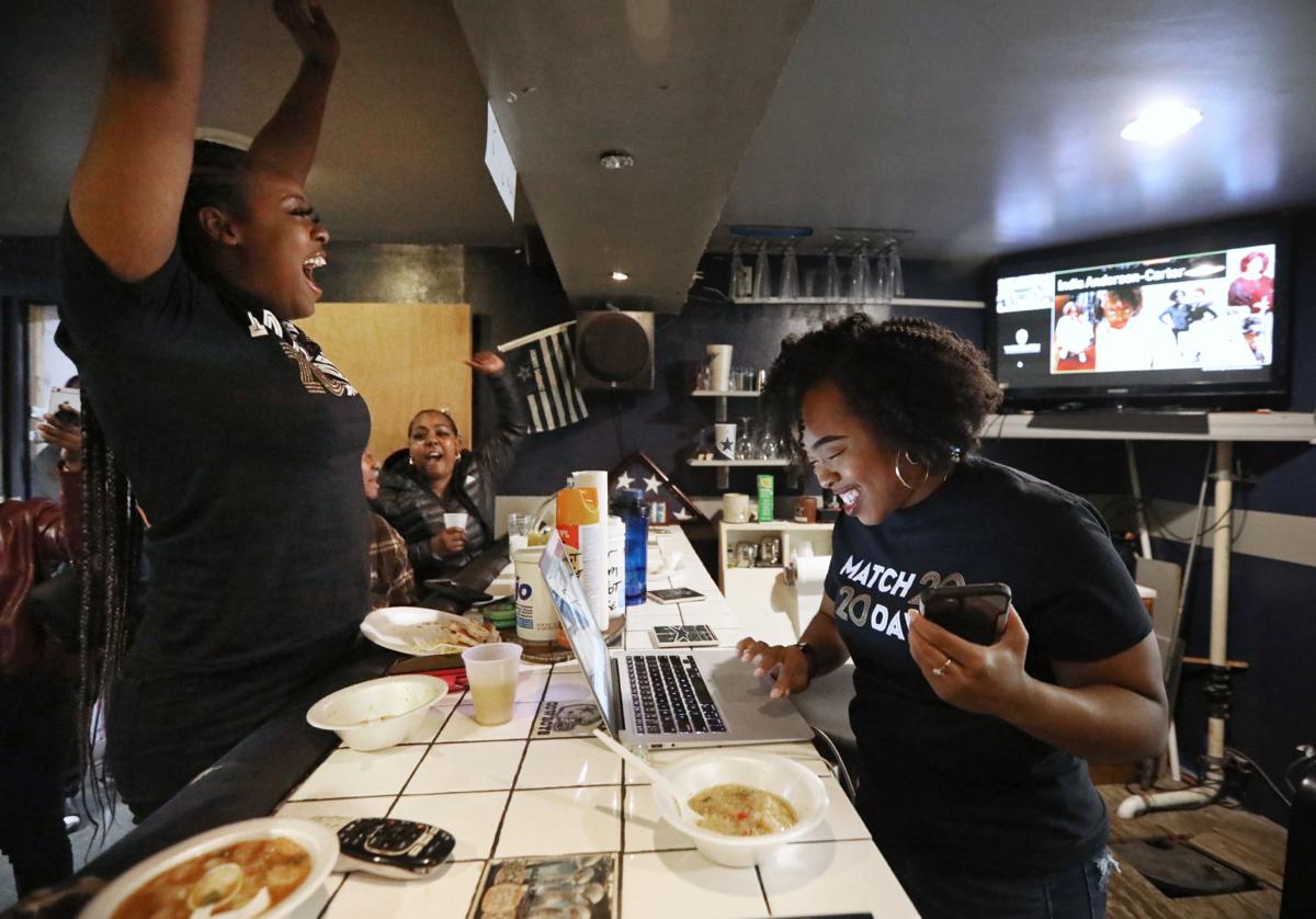 UW-Madison medical school student India Anderson-Carter, right, learned Friday where she will spend her medical residency. The "Match Day" celebration took place virtually because of the COVID-19 pandemic. She celebrates with friends and family, including her sister, Lexus, left.