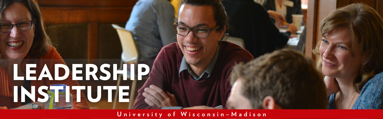 A group of people smile as they talk while seated around a circular table. The words "Leadership Institute, University of Wisconsin–Madison" are overlaid.
